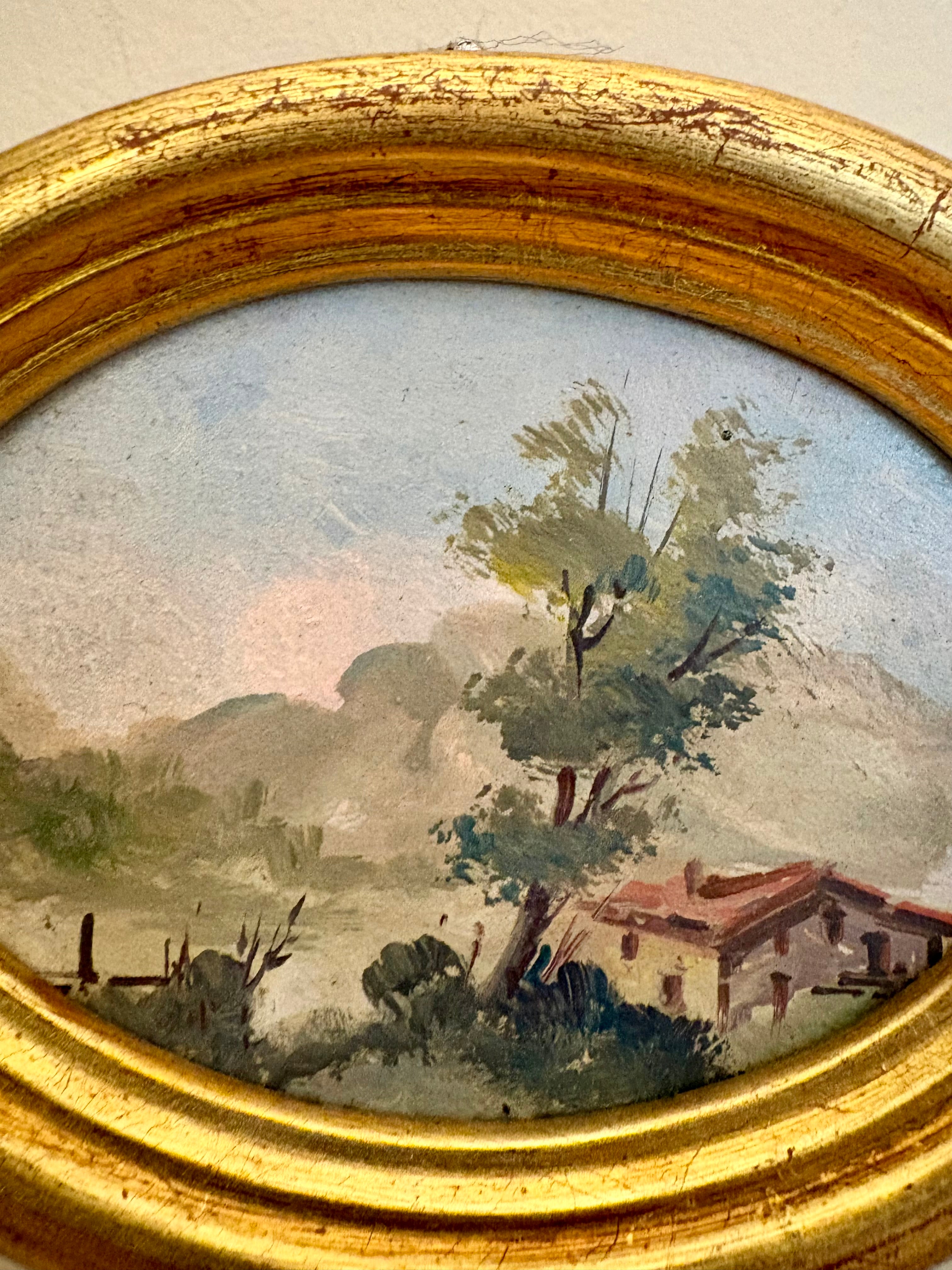 Petit paysage ancien – Huile sur panneau, cadre ovale doré