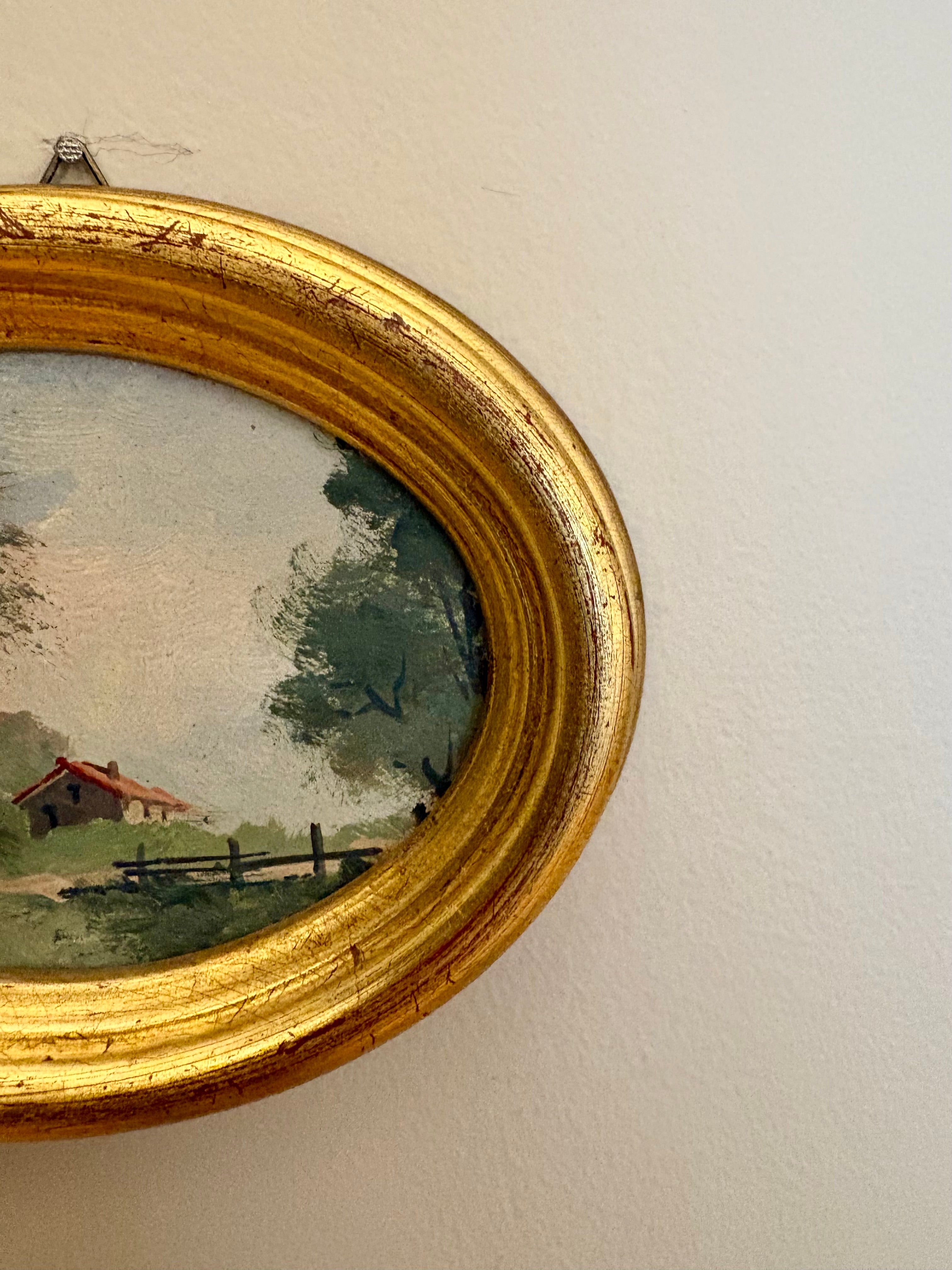 Petit paysage ancien – Huile sur panneau, cadre ovale doré